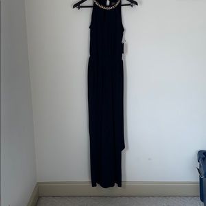 Navy blue jumpsuit with attached gold necklace